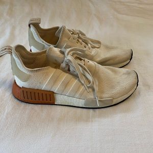 Cream and orange adidas tennis shoes